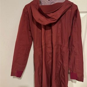 Kuhl long rain coat size lg with good and 2 do pockets